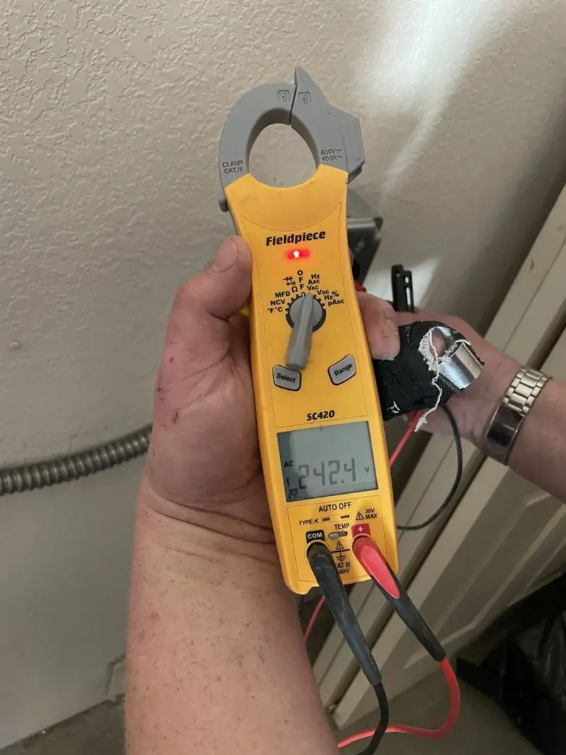 Voltage testing with clamp meter during Generator Installation in Emerald Lake Hills